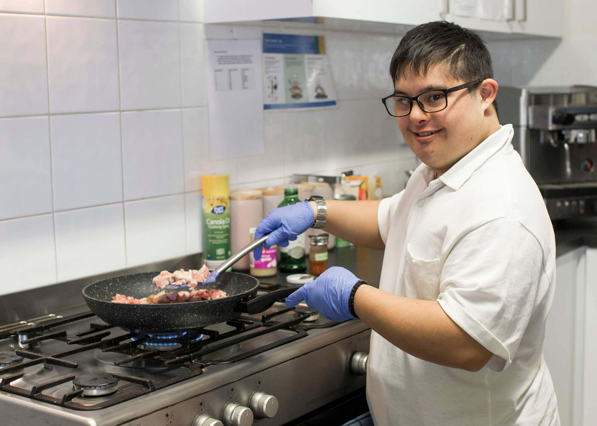activ client cooking in the kitchen - supported independent living